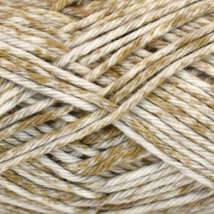 Close-up of beige and brown yarn strands