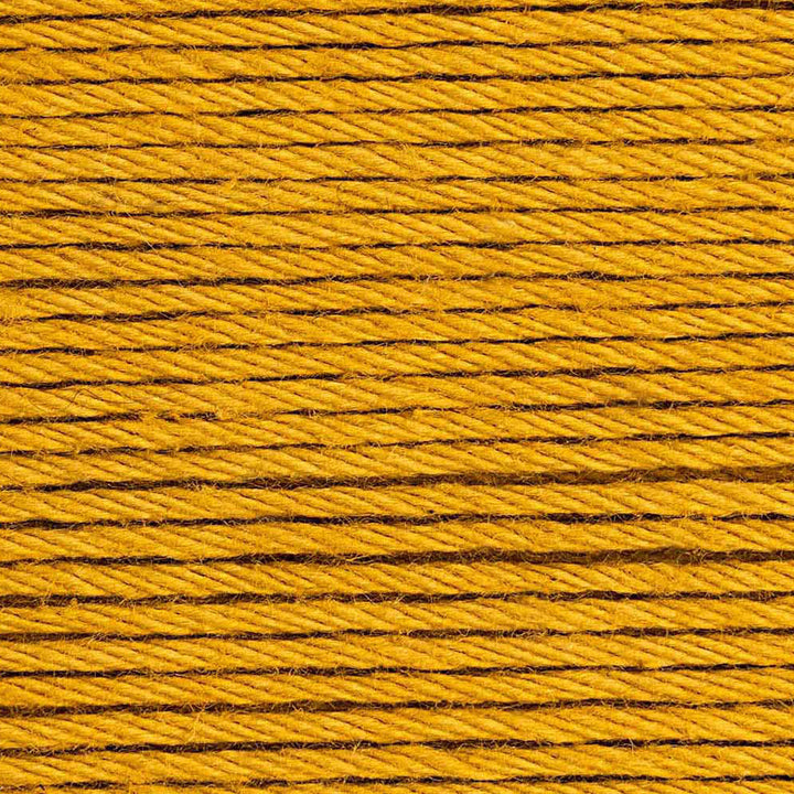 Close-up of yellow thread with visible texture