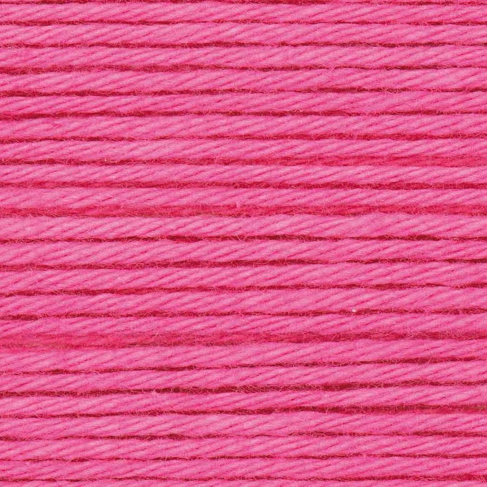 Close-up of pink thread with a textured pattern