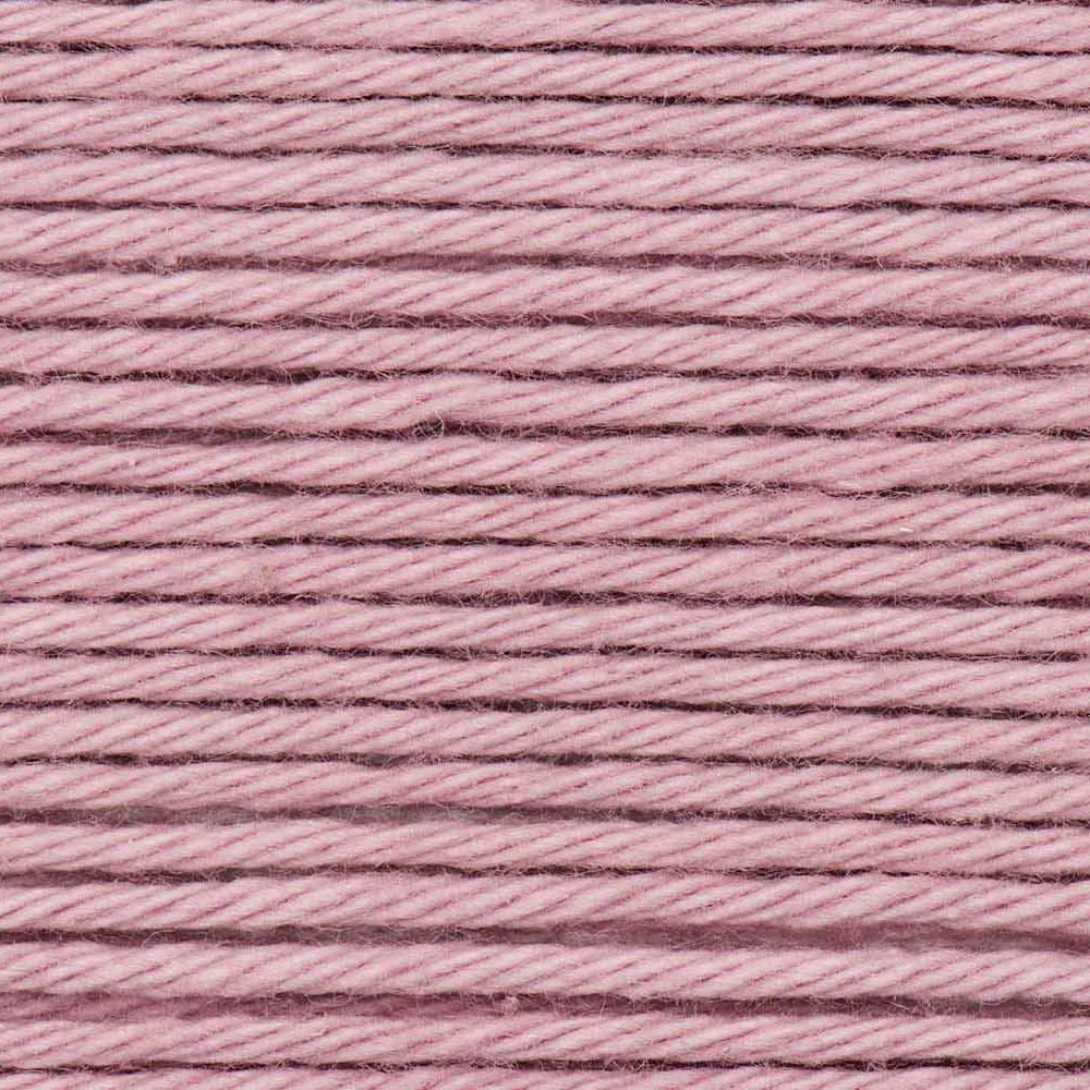 Close-up of pink yarn with a textured pattern