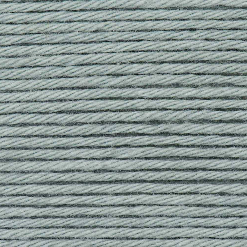 Close-up of light blue yarn with a textured pattern