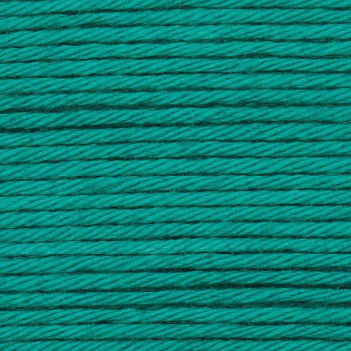 Close-up of teal yarn with a textured pattern