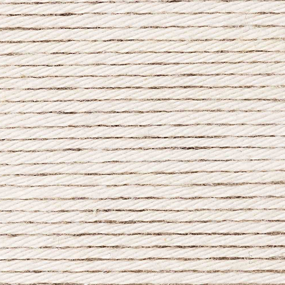 Close-up of a textured beige fabric surface