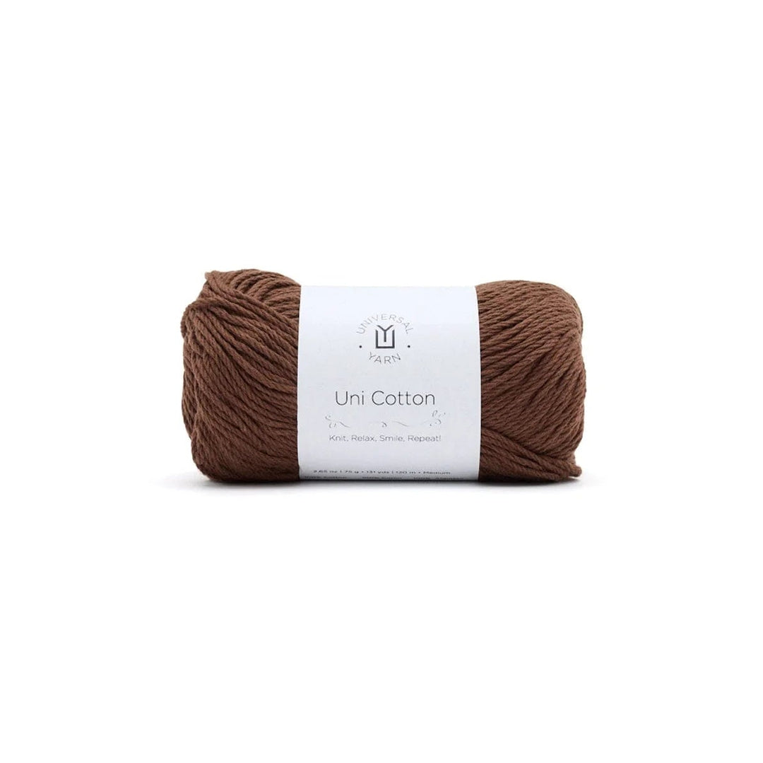 Brown yarn ball with a label on a white background