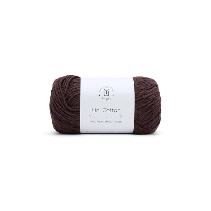 Brown ball of yarn on a white background