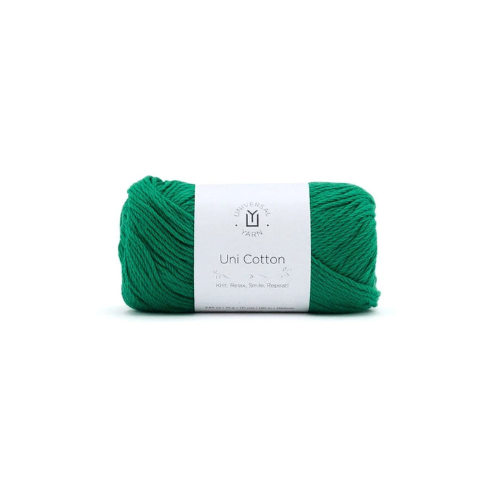 Green skein of yarn with a label on a white background