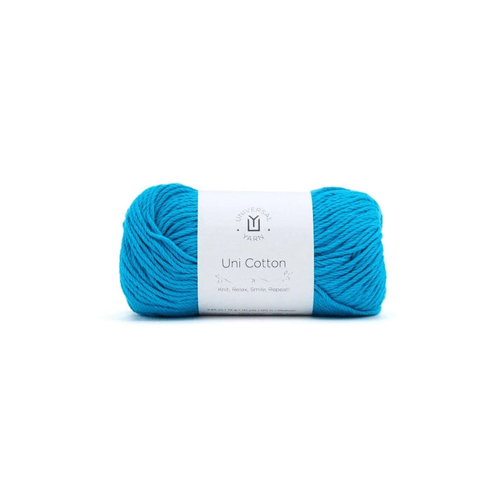 Blue skein of yarn with a white label on a white background