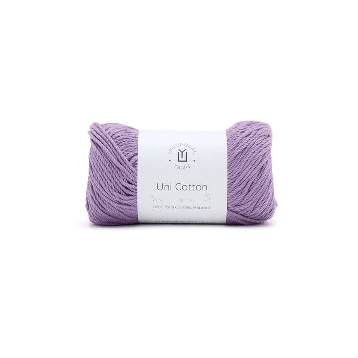 A skein of light purple cotton yarn with a white paper label, centered on a plain white background.