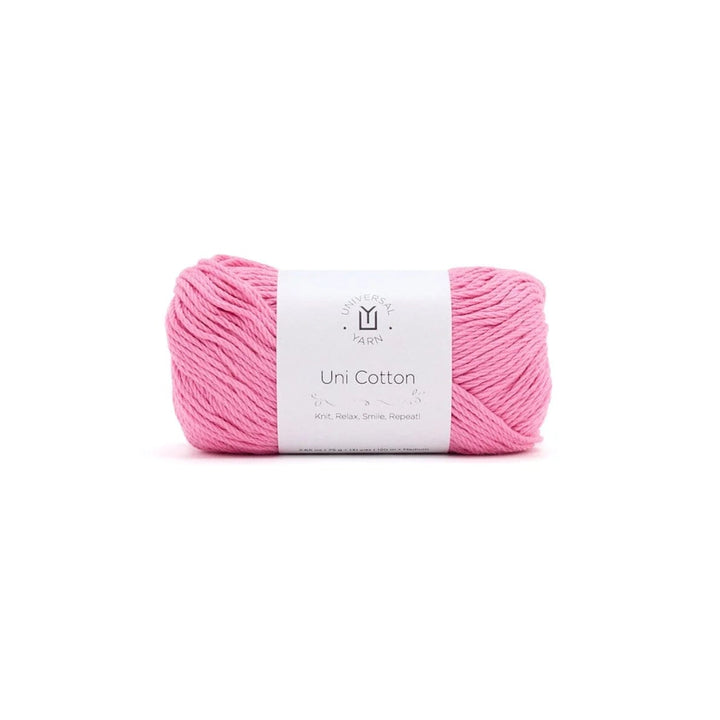 A skein of pink yarn with a white paper label reading 'Uni Cotton' and a small 'M' logo, centered on a plain white background.