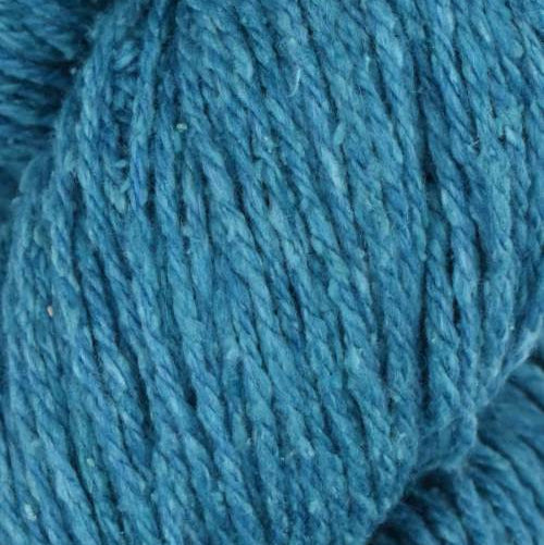 Close-up of blue yarn with a textured surface