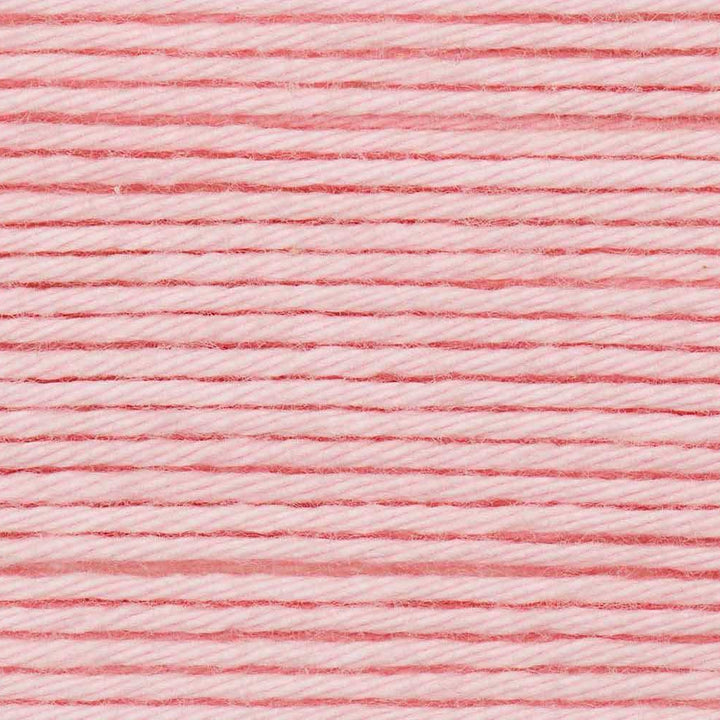 Close-up of pink yarn with a textured pattern