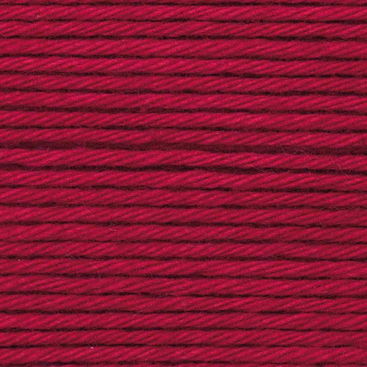 Close-up of red yarn with visible texture