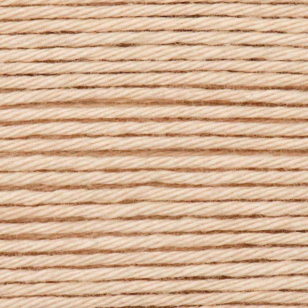 Close-up of beige thread with a textured pattern